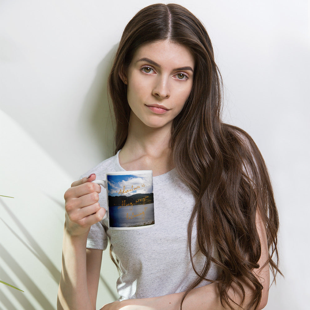 A woman handle a white 11 oz glossy mug with Rockport Reservoir image.