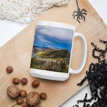 Load image into Gallery viewer, White 15 oz, glossy mug with Flaming Gorge image and halloween decor 
