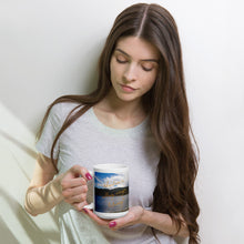 Load image into Gallery viewer, A woman handle a white 15 oz glossy mug with Rockport Reservoir image.
