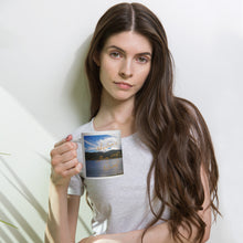 Load image into Gallery viewer, A woman handle a white 20 oz  glossy mug with Rockport Reservoir image.
